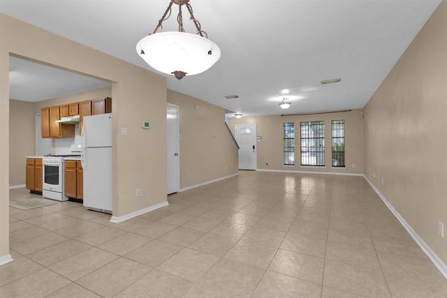 11539 Byronstone Dr, Houston, TX 77066 - unfurnished living room featuring light tile patterned floors and baseboards