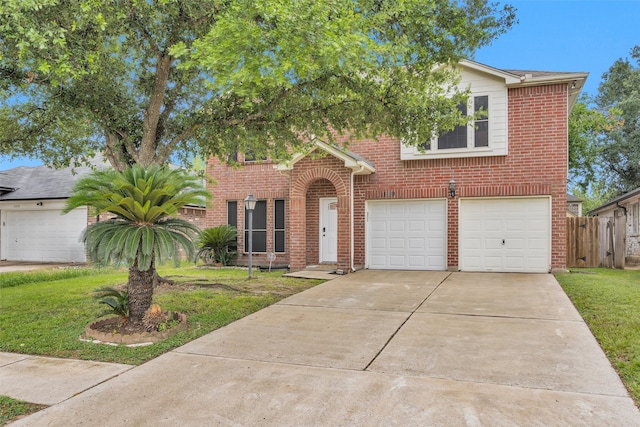 11539 Byronstone Dr, Houston, TX 77066 - view of front of home featuring brick siding, a garage, and driveway