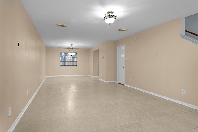 11539 Byronstone Dr, Houston, TX 77066 - empty room featuring light tile patterned floors and baseboards