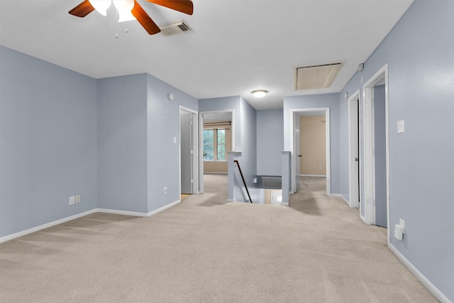 11539 Byronstone Dr, Houston, TX 77066 - carpeted empty room featuring attic access, a ceiling fan, and baseboards