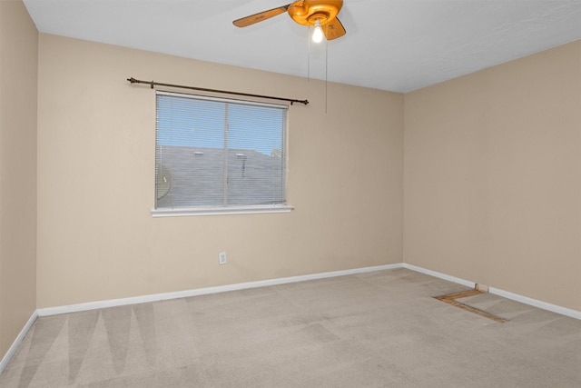 11539 Byronstone Dr, Houston, TX 77066 - carpeted spare room featuring baseboards and ceiling fan