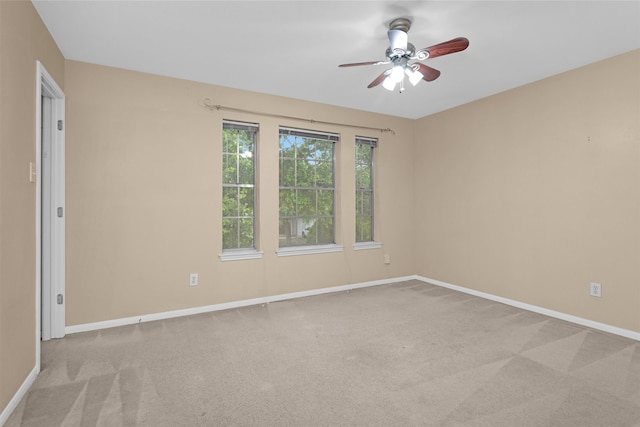 11539 Byronstone Dr, Houston, TX 77066 - spare room featuring carpet, baseboards, and ceiling fan