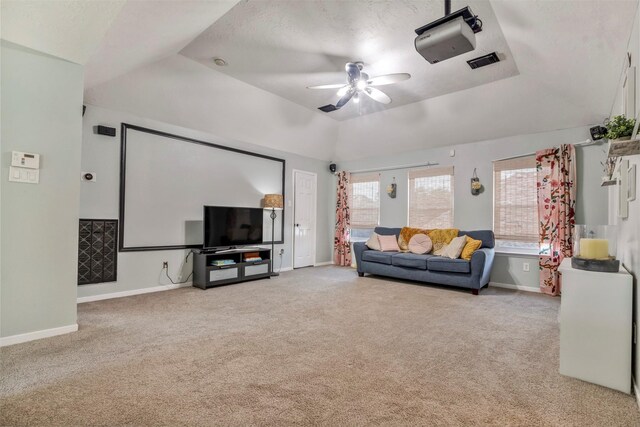 10010 Silverwood Way, Houston, TX 77070 - carpeted living area with ceiling fan, vaulted ceiling, and baseboards