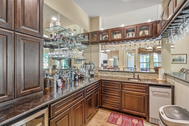 27309 S Lazy Meadow Way, Spring, TX 77386 - indoor wet bar featuring beverage cooler, dishwasher, and light tile patterned floors