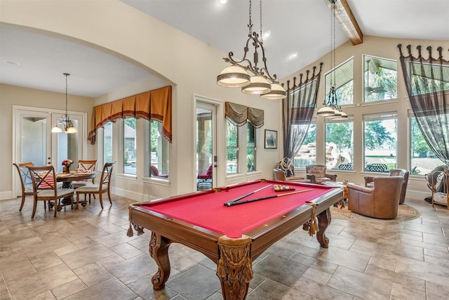 27309 S Lazy Meadow Way, Spring, TX 77386 - recreation room with beam ceiling, arched walkways, baseboards, pool table, and stone tile flooring