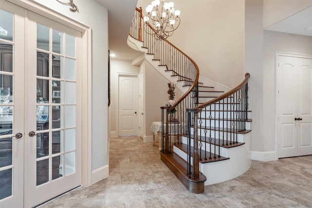 27309 S Lazy Meadow Way, Spring, TX 77386 - stairway featuring a chandelier, baseboards, and french doors