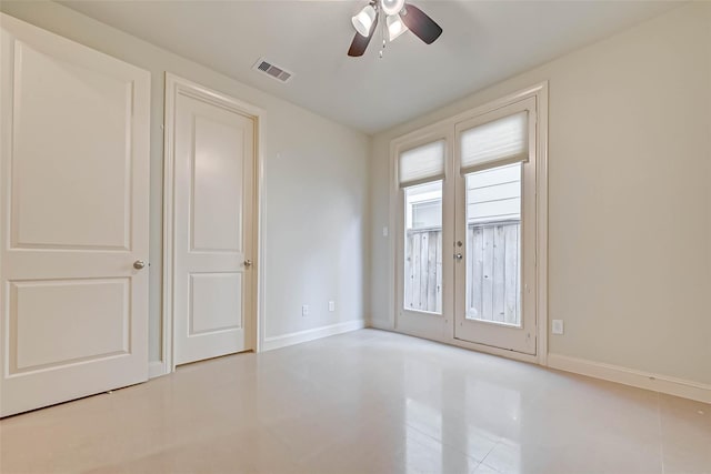 5617 Kiam St Unit A, Houston, TX 77007 - unfurnished room with a ceiling fan, baseboards, and tile patterned flooring
