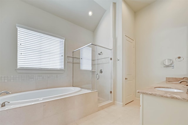 5617 Kiam St Unit A, Houston, TX 77007 - bathroom featuring a stall shower, a garden tub, vanity, and tile patterned flooring