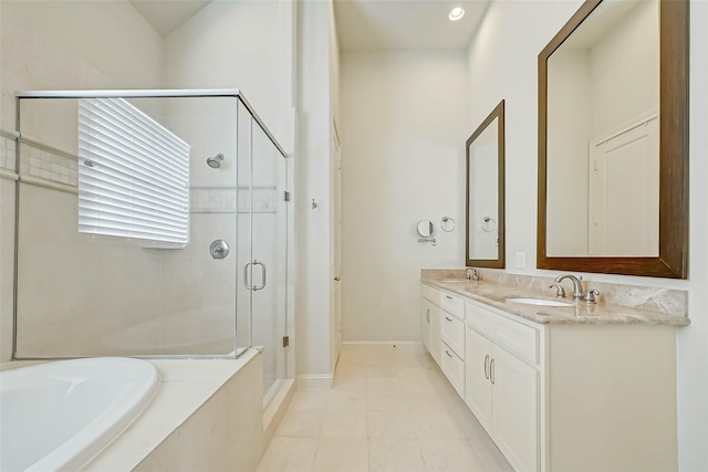 5617 Kiam St Unit A, Houston, TX 77007 - full bath with a stall shower, a bath, double vanity, and baseboards