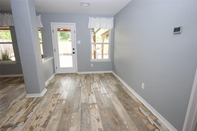 8611 Riverbend Canyon Ln, Houston, TX 77089 - entryway with hardwood / wood-style floors and baseboards