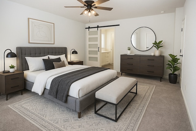 8611 Riverbend Canyon Ln, Houston, TX 77089 - bedroom with a barn door, light colored carpet, baseboards, connected bathroom, and a ceiling fan