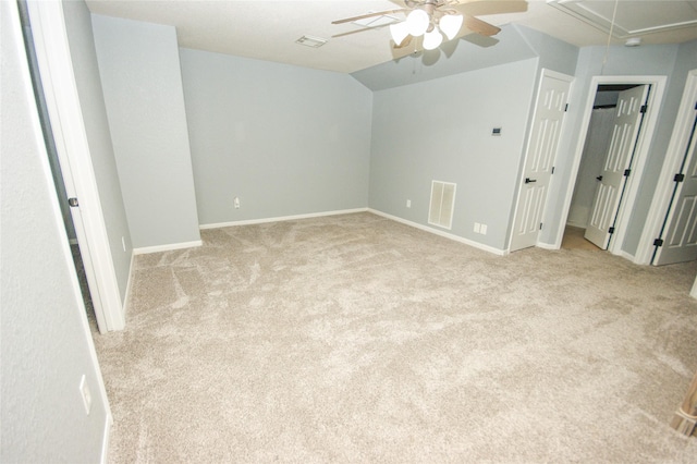 8611 Riverbend Canyon Ln, Houston, TX 77089 - unfurnished bedroom featuring attic access, light colored carpet, lofted ceiling, baseboards, and a ceiling fan