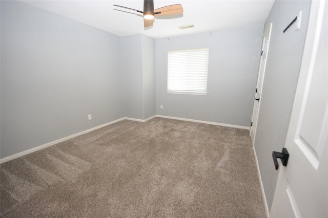 8611 Riverbend Canyon Ln, Houston, TX 77089 - spare room featuring carpet floors, baseboards, and ceiling fan