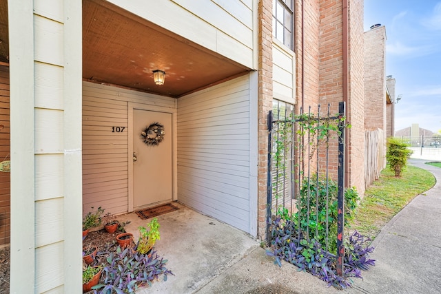 9090 S Braeswood Blvd Unit 107, Houston, TX 77074 - view of exterior entry