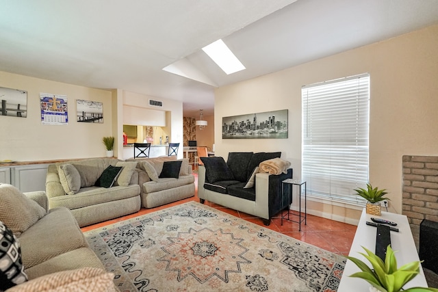 9090 S Braeswood Blvd Unit 107, Houston, TX 77074 - tiled living room featuring healthy amount of natural light, lofted ceiling, a skylight, and baseboards