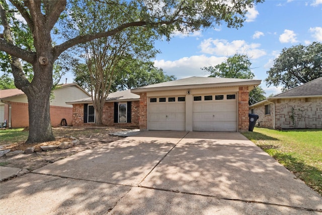20074 Crazy Horse Circle Dr, Katy, TX 77449 - single story home featuring brick siding, driveway, and a garage