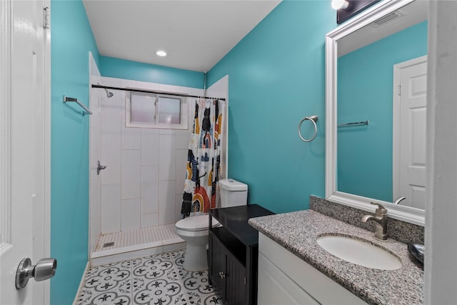 20074 Crazy Horse Circle Dr, Katy, TX 77449 - full bathroom with toilet, vanity, a shower stall, and recessed lighting
