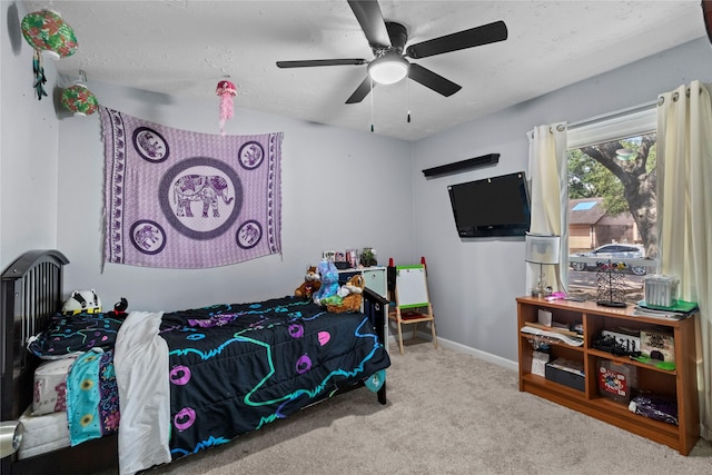 20074 Crazy Horse Circle Dr, Katy, TX 77449 - carpeted bedroom with ceiling fan and baseboards