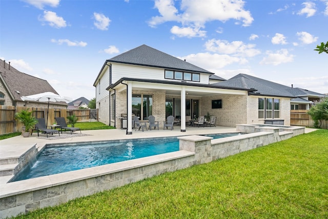 20511 Grazing Foal Ln, Tomball, TX 77377 - back of property with brick siding, a patio, and a pool with connected hot tub