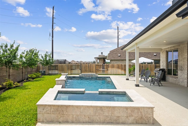 20511 Grazing Foal Ln, Tomball, TX 77377 - view of swimming pool featuring a patio and a pool with connected hot tub