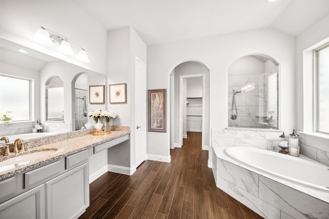 20511 Grazing Foal Ln, Tomball, TX 77377 - bathroom with plenty of natural light, a tile shower, a garden tub, vanity, and lofted ceiling