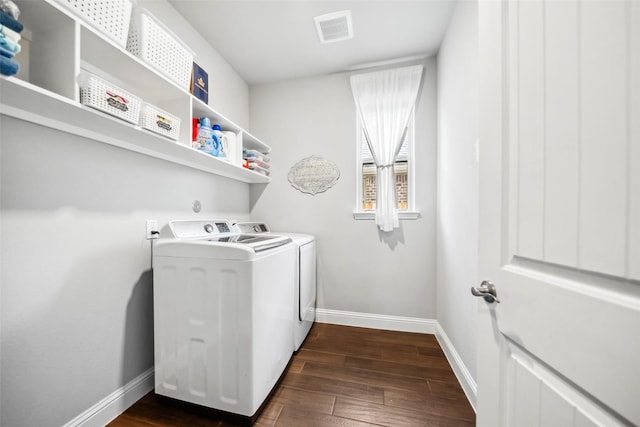 20511 Grazing Foal Ln, Tomball, TX 77377 - washroom with separate washer and dryer, dark wood-style floors, and baseboards