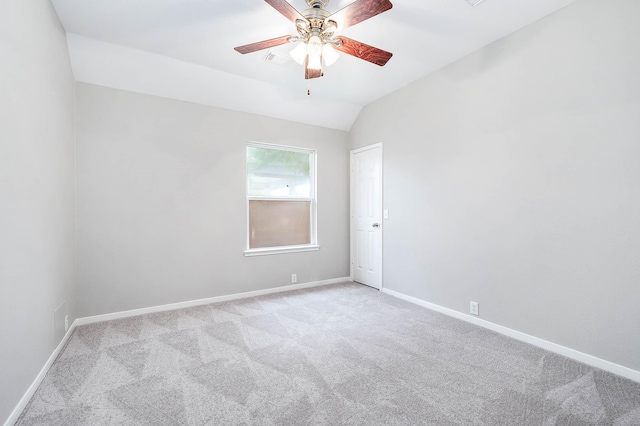 2604 Sunday House Ct, Pearland, TX 77584 - spare room featuring light carpet, ceiling fan, baseboards, and lofted ceiling