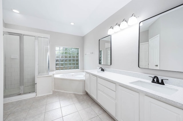 2604 Sunday House Ct, Pearland, TX 77584 - bathroom featuring double vanity, a bath, a shower stall, tile patterned floors, and recessed lighting