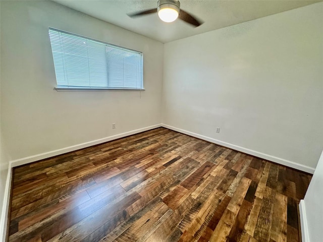 3611 Acorn Way Ln, Spring, TX 77389 - unfurnished room with dark wood-type flooring, ceiling fan, and baseboards