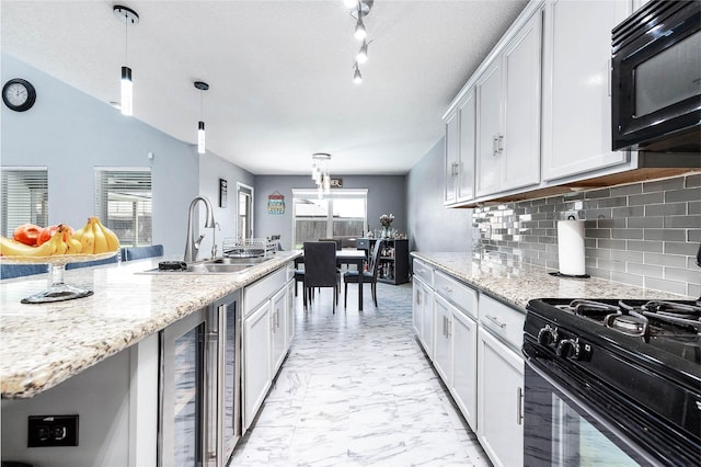 18110 Tenasserim Pine Trce, Richmond, TX 77407 - kitchen featuring black appliances, a sink, beverage cooler, light marble finish flooring, and tasteful backsplash