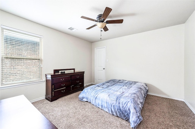 18110 Tenasserim Pine Trce, Richmond, TX 77407 - bedroom with carpet floors, baseboards, and ceiling fan