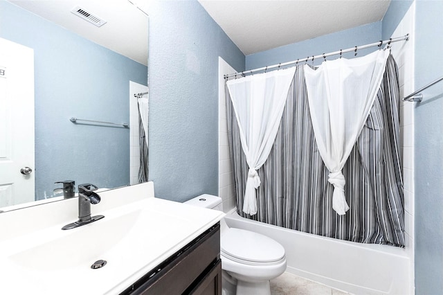 18110 Tenasserim Pine Trce, Richmond, TX 77407 - full bathroom with vanity, shower / bath combo, toilet, and a textured wall