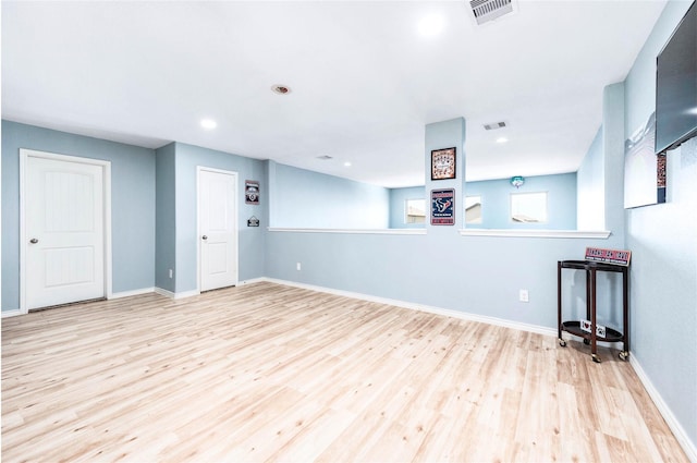 18110 Tenasserim Pine Trce, Richmond, TX 77407 - unfurnished room with wood finished floors, baseboards, and recessed lighting