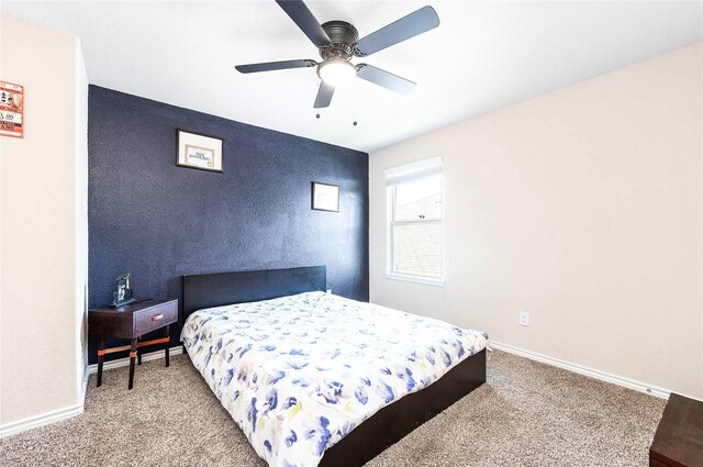 18110 Tenasserim Pine Trce, Richmond, TX 77407 - bedroom with carpet flooring, baseboards, and ceiling fan