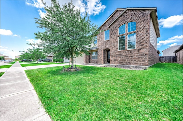 18110 Tenasserim Pine Trce, Richmond, TX 77407 - view of front of home with brick siding, driveway, and an attached garage