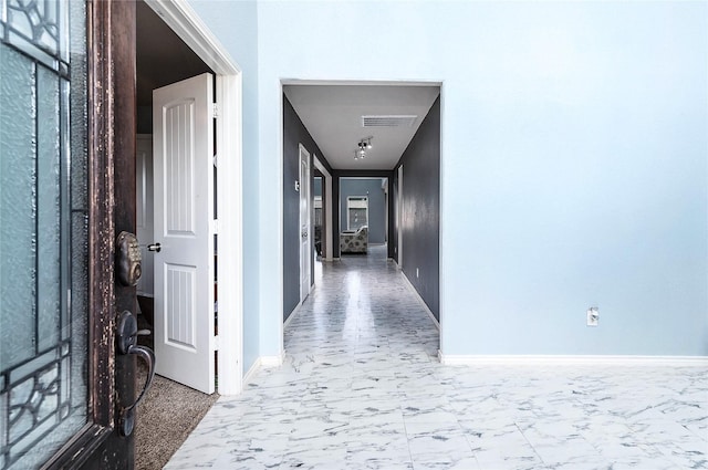 18110 Tenasserim Pine Trce, Richmond, TX 77407 - corridor featuring marble finish floors and baseboards