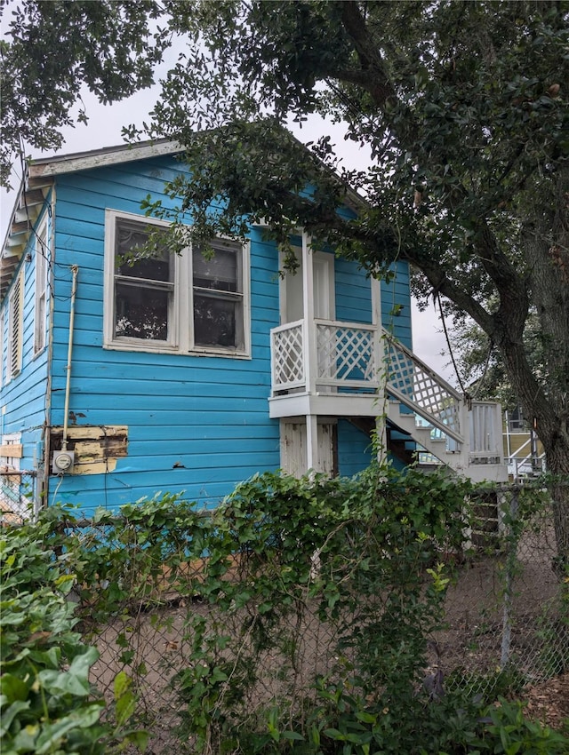 1912 52nd St, Galveston, TX 77551 - view of front of home with stairway