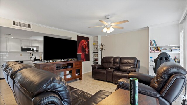 14777 Wunderlich Dr Unit 2013, Houston, TX 77069 - living area with ceiling fan, light tile patterned flooring, and ornamental molding