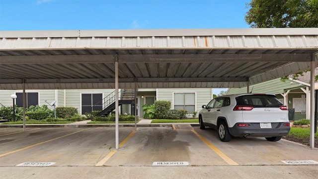 14777 Wunderlich Dr Unit 2013, Houston, TX 77069 - covered parking lot featuring stairway