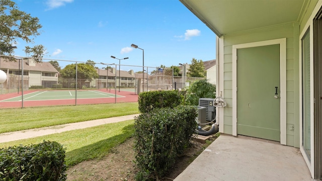 14777 Wunderlich Dr Unit 2013, Houston, TX 77069 - view of tennis court with a residential view