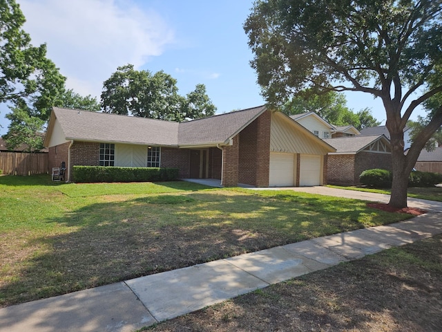 21631 Park Villa Dr, Katy, TX 77450 - view of front of property with a garage, brick siding, and driveway