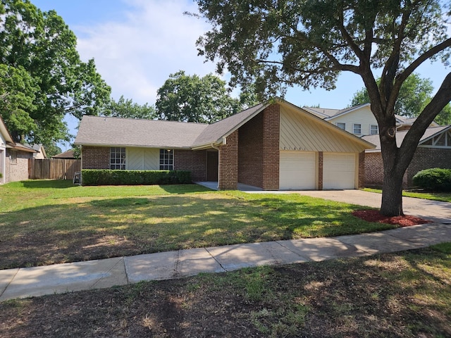 21631 Park Villa Dr, Katy, TX 77450 - view of front of home with brick siding, an attached garage, and concrete driveway