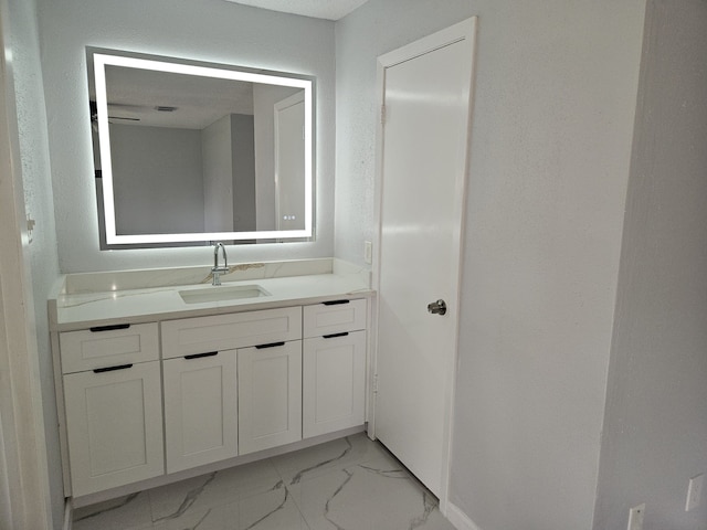 21631 Park Villa Dr, Katy, TX 77450 - bathroom with marble look tile flooring and vanity