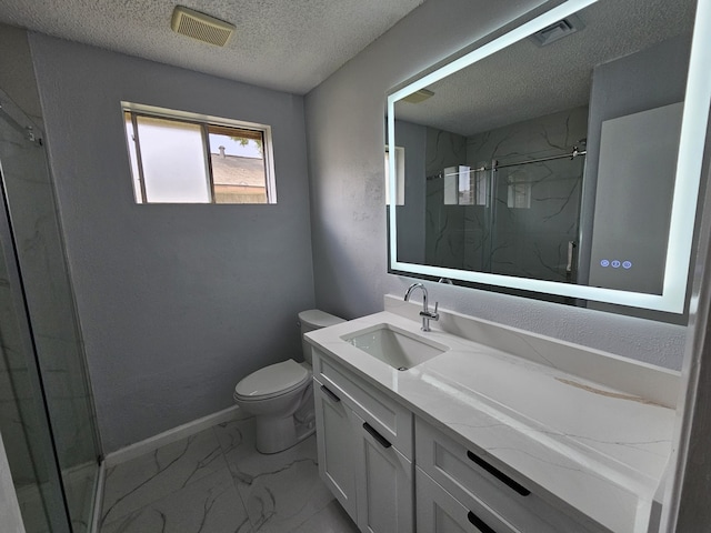 21631 Park Villa Dr, Katy, TX 77450 - bathroom featuring a marble finish shower, a textured ceiling, marble finish flooring, toilet, and vanity