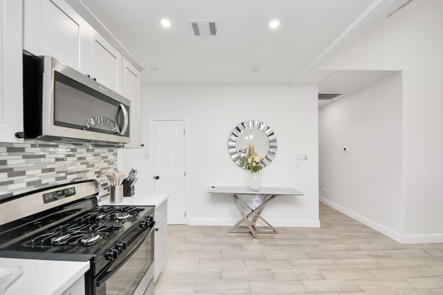 3707 Kingston Vale Dr, Houston, TX 77082 - kitchen featuring stainless steel appliances, backsplash, light countertops, recessed lighting, and baseboards