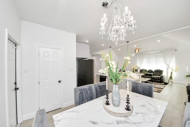 3707 Kingston Vale Dr, Houston, TX 77082 - dining room featuring a chandelier, baseboards, a ceiling fan, and recessed lighting