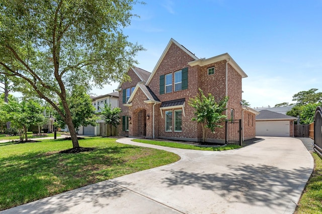 415 Faust Ln, Houston, TX 77024 - traditional-style home featuring brick siding, an outbuilding, and a detached garage