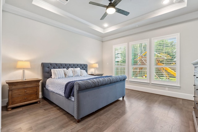 415 Faust Ln, Houston, TX 77024 - bedroom with a raised ceiling, ornamental molding, wood finished floors, baseboards, and ceiling fan