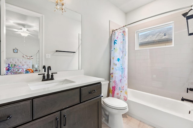 415 Faust Ln, Houston, TX 77024 - bathroom featuring vanity, toilet, shower / bath combo, and a ceiling fan