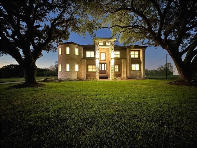 7737 Brookside Rd, Pearland, TX 77581 - view of front of home with a front lawn